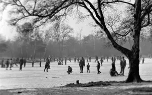 People skating on a frozen lake during a particularly cold winter in February 1963