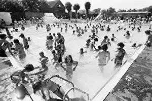 People try to keep cool at a Birmingham lido during the summer heatwave of 1976