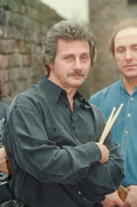 Alley Prints: Pete Best, (in the black shirt holding his drum sticks) posing for the camera with his