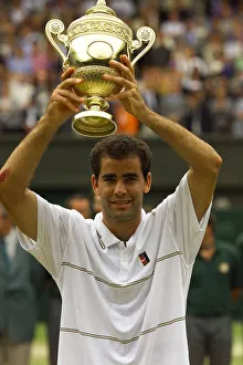 Pete Sampras lifts trophy after winning Wimbledon title 1999 against Andre Agassi in