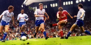 Peter Beardsley scores for Liverpool against Manchester United at Anfield