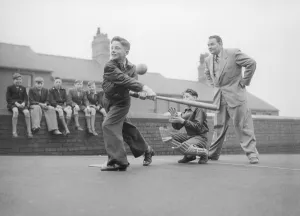 Peter Benson, Royston Reavley and Paul Berger seen here learning to play baseball