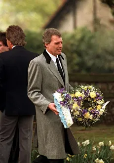 Peter Dean Actor carrying a wreath at the funeal of Mark Reid the son of Comedian Actor