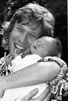 Peter Duncan TV Presenter who was on the Childrens TV Programme Blue Peter holding his