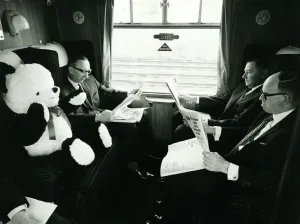 Businessmen Prints: Peter the Panda travels First class on the train to Sheffield to meet Dick Emery