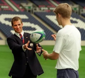Passing Prints: Peter Phillips september 1999 passes the ball at Murrayfield stadium this morning as part