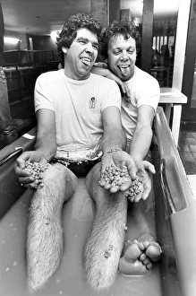 Peter Porter (left) and Rodney Woods soak in a bath of mushy peas for the Childrens Heart