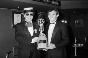 01073 Prints: Peter Reid of Everton FC with Elton John at the PFA Players Player of the Year event