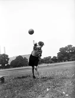 Peter Saunders training for sport at Battersea athletic track. 19th August 1954