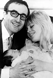Peter Sellers and his wife Britt Ekland pictured with their first baby, Victoria