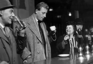 Coffee Prints: Peter Woods a reporter on the Daily Mirror drinks a cup of coffee in a public house bar