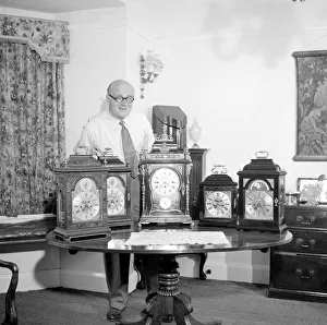00177 Prints: Peter Yorke, orchestra leader seen here with a collection of clocks June 1957