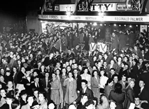 Bill Pethers and his Orchestra performing outside the Coventry Hippodrome Theatre on VE