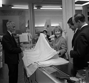 Petula Clark and her husband Claude Wolff go shopping in Regent Street when they were