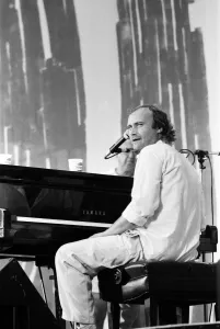 Phil Collins perforing at the Live Aid concert in Philadelphia, USA. 13th July 1985