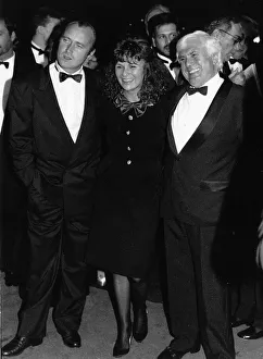 Ties Prints: Phil Collins singer actor with Julie Walters and Buster Edwards in September 1988