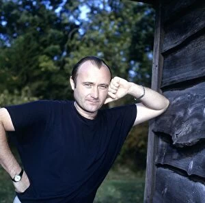 Images Dated 1st December 1989: Phil Collins singer, songwriter & drummer pictured at home December 1989