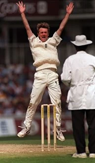 Images Dated 20th August 1999: Phil Tufnell of England aug 1999 leaps into the air after taking the wicket of