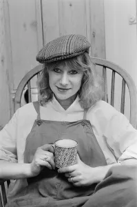 01000 Prints: Photo shows Helen Mirren seated in her country Windsor chair wearing her favourite cap