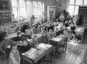 Teachers Prints: Our photograph shows happy faces in the classrom despite the news that a new campaign is