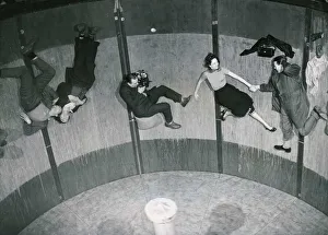 Men And Women Prints: Photographer frank Charman tries to photograph actress Natasha Parry on the Rotor ride