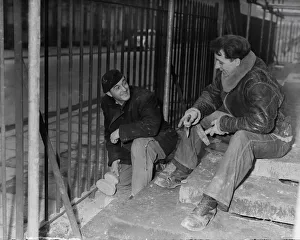 Builders Prints: Photographer Heanly Harry Hussey, stonemason, repairing step at Christchurch