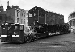 Electric Prints: Pickfords transport a diesel electric locomotive train engine from Newton le Willows