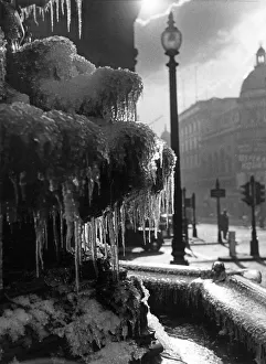 Frozen Prints: Picture shows the icicles which have formed on the Eros statue in Piccadilly Circus