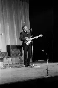 Picture shows John Lennon. The Beatles rehearse at The Prince of Wales Theatre in