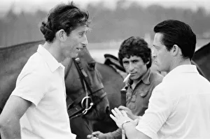 01053 Prints: Picture shows Prince Charles (left) talking to his friend, possibly