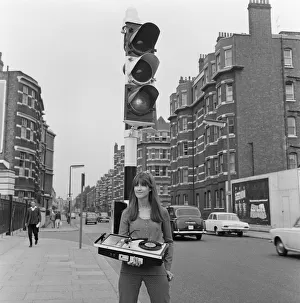 Record Player Prints: Picture shows The Ready Steady Go TV pop show presenter Cathy McGowan holding a