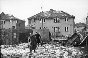 Damage Collection: Picture shows residents of Aldborough Grove, in Hull, Yorkshire, after an air raid