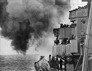 Libya Prints: Picture taken on board a British Battleship as it takes part in a naval bombardment of
