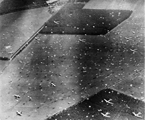 Parachutes Prints: Picture taken from a reconnaissance Spitfire showing gliders