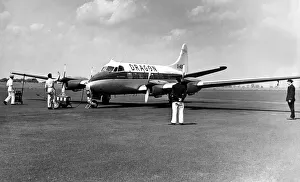 00352 Prints: Pictured is a de Havilland Heron propeller-driven small airliner operated by Dragon