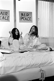 Pictured on their honeymoon'bed newly weds. John Lennon