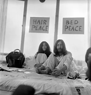 Pictured on their honeymoon'bed newly weds. John Lennon