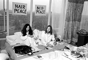 Pictured on their honeymoon'bed newly weds. John Lennon
