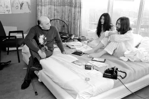 Pictured on their honeymoon'bed newly weds. John Lennon