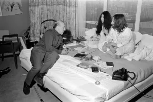 Pictured on their honeymoon'bed newly weds. John Lennon