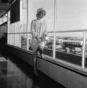 Pictured leaving London Airport for Rome is actress Julie Christie