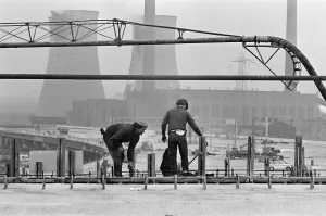 Pictured, workmen put last minute touches to a section of the M6 Gravelly Hill