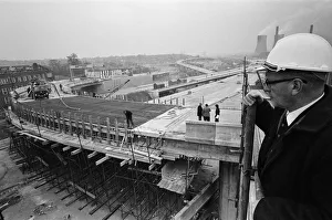 01516 Prints: Pictured, workmen put last minute touches to a section of the M6 Gravelly Hill