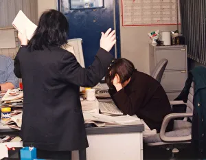 Aggression Prints: Pictures posed by models to illustrate bullying at work 01 / 06 / 95 circa