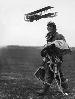 Pilot Prints: A pilot of 75 Squadron, RAF Driffield seen here walking back to the crew room as a