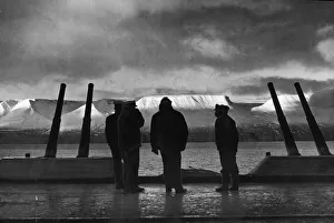 Cold Prints: Pilots of the Royal Navy Fleet Air Arm watch the sun strike the snow covered mountains