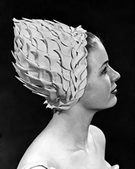 00030 Prints: Pineapple Pretty. Original cap with interwoven petals designed to give a girl height
