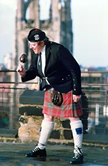 Piper Derek elliott samples a locally grown haggis in January 1994