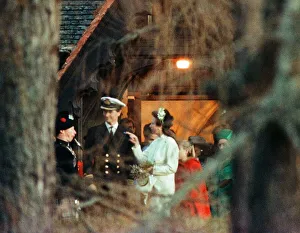 A piper pipes as Princess Anne and Tim Laurence leave the church after their wedding