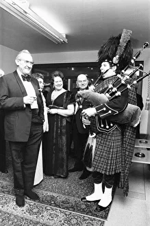 Bagpipes Prints: A piper welcomes the guest to the Birmingham and West Midlands Scottish Society Hogmanay